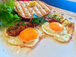 Masala Egg Half Fry Fried Egg Recipes Indian Breakfast Recipes Recipe Egg Recipes Indian Recipes Indian Breakfast