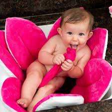 There's no need for shampoo; Genius Blooming Bath Just Put It In The Sink Bathe Baby Gently Squeeze Out The Excess Water And Throw It In Blooming Baby Bath Baby Tub New Baby Products