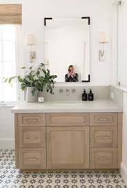 A wood floor and vanity give this city bathroom a warm and serene feeling. Small Bathroom Ideas Makeover Inspiration Life On Virginia Street