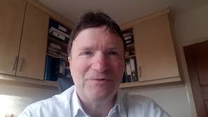 Lloyds Banking Group sees its quarterly profits drop by more than a quarter