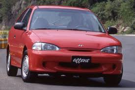 Image result for Cardinal Red 1999 Hyundai