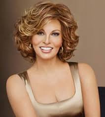 They frame the face and add dimension to the hair. New Hairstyle 2014 Medium Curly Layered Hairstyles With Bangs Images