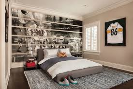 The boy s bedroom has a hockey theme pucks turned into l&s wallpaper. Football Themed Kids Room Teen Boys Room Sports 740x492 Download Hd Wallpaper Wallpapertip
