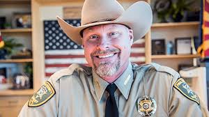 An Arizona sheriff who said he wouldn't enforce the state's stay-at-home  order has tested positive for Covid-19