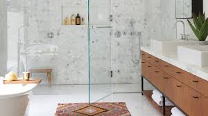 Opening up the shower area makes the bathroom feel larger. Design Debate Are Wet Room Style Bathrooms Serene Or Impractical House Home