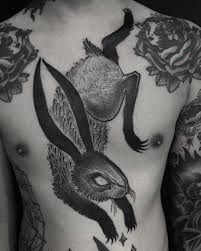 Cool Bw Rabbit Tattoo Idea On The Chest Rabbit Tattoos Tattoos Fantasy Tattoos