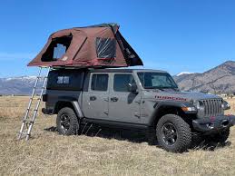 One of the most important attributes of the new gladiator is payload, which from the factory can range from 1 this provides the rare feature of a person being able to stand in the truck bed, while another sleeps in. 2020 Jeep Gladiator Unlimited Truck Camper Rental In Bozeman Mt Outdoorsy