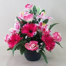 Choose from the wide if you wish to order artificial flowers for your loved ones online, you can head to ferns n petals where you will find many interesting options to choose from. Silk Flowers Filled Grave Pot Pink Gerberas And Lilies Freestanding Memorial Flowers