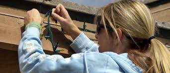 Instead of using nails and screws to attach christmas lights to shingles, head to your local department or home improvement store and look for clips that attach lights to shingles. How To Hang Christmas Lights With Gutter Guards Leaffilter