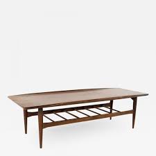 14.5h x 65.75l x 17.5w materials: Grete Jalk Grete Jalk Style Bassett Mid Century Walnut Surfboard Coffee Table