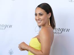 Busty Playboy model gives fight fans an eyeful at UFC 287 - she's a stunner