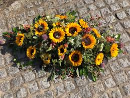 Step by step diy tutorial. Sunflower Casket Spray Welwyn Florist