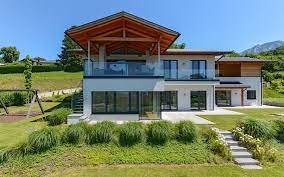 in dieser neuwertigen edel moblierten architektenvilla in steinbach am attersee thronen sie in erhabener ruhelage uber dem steinhauser haus architektur haus
