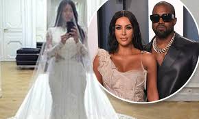 Close friend and designer riccardo. Kim Kardashian Shares Snaps Of Herself Trying On Her Wedding Dress Daily Mail Online