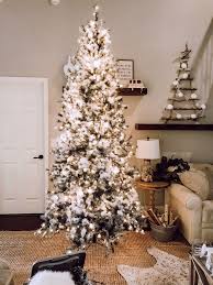 Have a very merry christmas. Neutral Christmas Tips For Decorating A Silver And Gold Christmas Tree