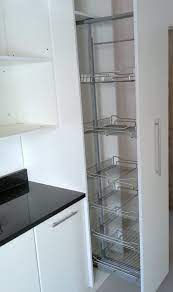 Created by dimension cabinets white melamine kitchen with pull out. Created By Dimension Cabinets White Melamine Kitchen With Pull Out Grocery Cupboard Storage Top Kitchen Cabinets Kitchen Furniture Design Kitchen Room Design