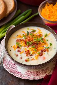 Loaded baked potato soup using chicken stock, cream cheese, and sour cream and then add cheddar cheese : The Best Potato Soup Recipe Cooking Classy
