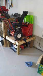 Space Saver For Garage Lawn Mower And Snow Blower On Top Lawn Tool Storage Storage Shed Organization Diy Garage Storage