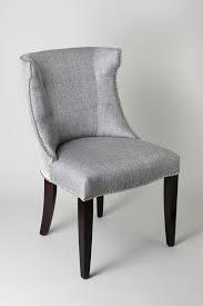 A wing chair or wingback chair is an easy chair with wings and it is basically made to relax the arms and back. Luxury Wingback Upholstered Dining Chair