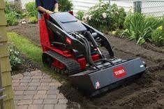 Fixing Grade Problems In Your Lawn Toro Yard Care Blog Sloped Backyard Yard Care Yard Drainage
