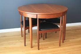 Splurge on a teak dining set to get the party started outdoors. Mid Century Modern Finds Modern Kitchen Tables Midcentury Modern Kitchen Table Dining Room Decor Modern