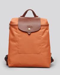 9 Waterproof Products You Ll Need For April Showers Longchamp Backpack Longchamp Handbags Beige Backpacks