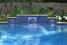 If you live in cypress, a pool is an essential way to beat the heat. Pin By Aqua Blue Pools On Pool Ideas Pool Water Features Pool Waterfall Backyard Pool