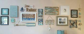 Its ocean color and distressed design contribute to its charming appeal. Liking My Coastal Themed Gallery Wall Beach Theme Wall Decor Coastal Gallery Wall Gallery Wall Decor