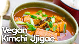 So, whatever pot you are using, and after however much cabbage and kimchi liquid you have put into the pot, fill it with a good broth of any kind. Cooking Korean Vegan Kimchi Stew Recipe Kimchi Jjigae Youtube