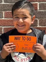 Ms. Stokes' Kindergarten class set their own goals and help track their own  data and growth throughout the year. ALL of them have officially met their  big Literacy goals for the year!