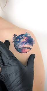 This tattoo has a strong sense of motion. Watercolor Tattoos Will Turn Your Body Into A Living Canvas Watercolor Galaxy Tattoo Watercolor Tattoo Galaxy Tattoo