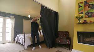 You can use area rugs, tall shelves, screen dividers and wall dividers. Ceiling Track Room Divider Kit How To Video Divideandconquer Youtube