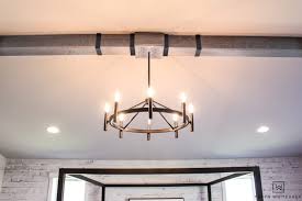 It's slanted on the sides like a vaulted ceiling, but it's flat in the middle. Diy Wood Beams Taryn Whiteaker