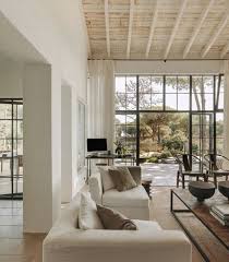 Metal Door Frames And White Washed Wood Ceiling Living Room Decor Inspiration House Interior House Design