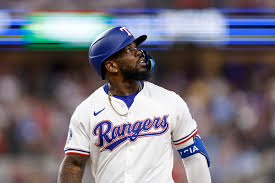 After struggling through July, Adolis García sits for Texas Rangers' first game in August