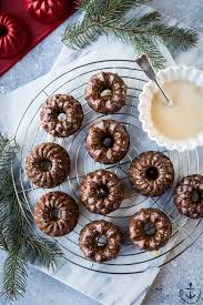 Combine cake mix, pudding, oil, eggs, sherry and butter in a mixing bowl. Mini Gingerbread Bundt Cakes With Maple Glaze The Beach House Kitchen