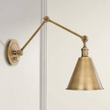 A handsome american craftsman swing arm wall sconce is accented with a mission hill top pattern. Robert Abbey Alloy Warm Brass Plug In Swing Arm Wall Lamp 42e35 Lamps Plus