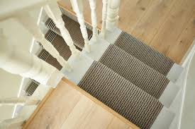 The leopard patterned carpet in this luxurious staircase is very extraordinary and cool. Installing Stair Runners Roger Oates Hudson Flooring