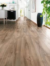 Offering A Relaxed Timber Look With The Durability Of Laminate Image Credit Formica H Vinyl Wood Flooring Waterproof Laminate Flooring Wood Laminate Flooring