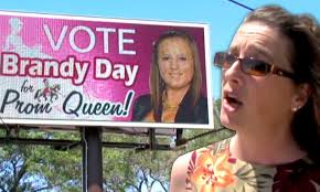 Mother buys rotating pink BILLBOARD to promote her daughter for prom queen 