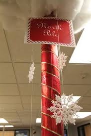 How to decorate the front desk for christmas? 26 Christmas Office Decor Ideas Office Christmas Decorations Office Christmas Christmas Cubicle Decorations