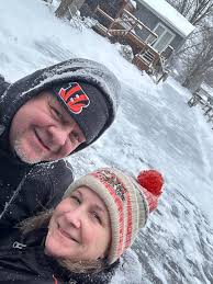 Clearing snow from our driveway as a team