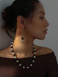 Boucles d'oreilles en ébène et en argent brossées