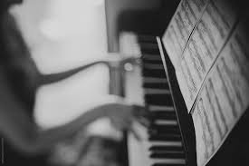 In theory, you could replicate everything that silver effex pro 2 does using photoshop. Black And White Picture Of A Young Woman Playing On A Piano Using A Note Sheet By Paff Piano Play
