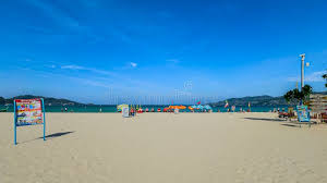 Patong Beach Phuket Thailand Nice White Sandy Beach Clear Blue and  Turquoise Waters and Lovely Blue Skies Stock Photo