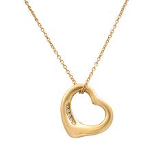 This tiffany ten row necklace is made of.925 sterling silver and features a darling heart joining ten mesh chains, giving this piece a unique and elegant look. Tiffany Co 18k Rose Gold Elsa Peretti Open Heart Pendant 0 02cts Ebay