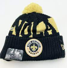 New Orleans Saints New Era 2020 Nfl Sideline Official Sport Pom Cuffed Knit Hat Black Gold Nfl Hats New Saints Knitted Hats