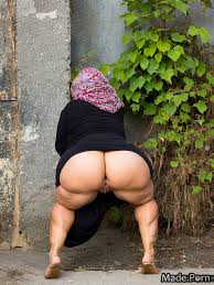 Porn image of muscular niqab hijab squatting 70 flexible upskirt created by  AI
