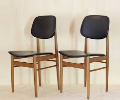 pair of vintage dining chairs by ico