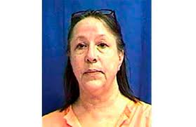 Iowa woman gets 50 years in prison for 1992 beating death